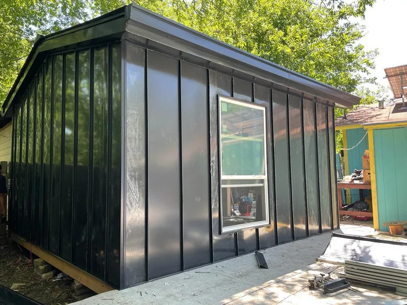 Black standing seam metal wall panels for Metal Roof Installation in Sandwich